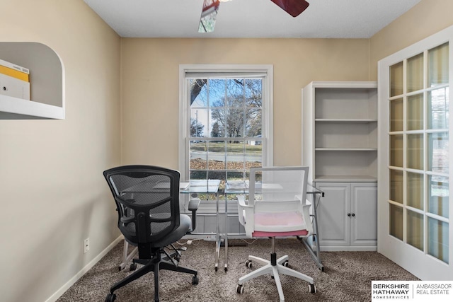 home office featuring ceiling fan and carpet floors