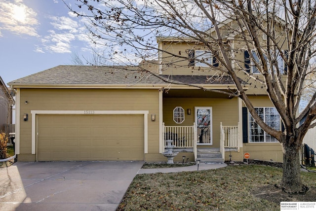 view of front of property with a garage