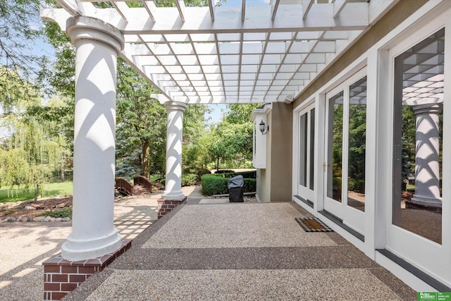 view of patio featuring a pergola