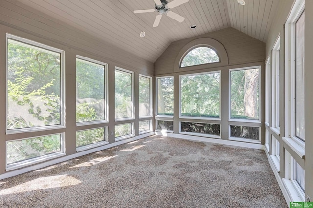 unfurnished sunroom with ceiling fan, lofted ceiling, and wood ceiling