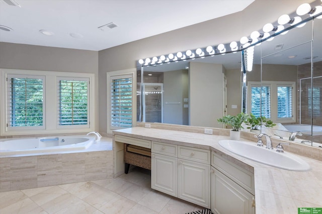 bathroom featuring plus walk in shower and vanity