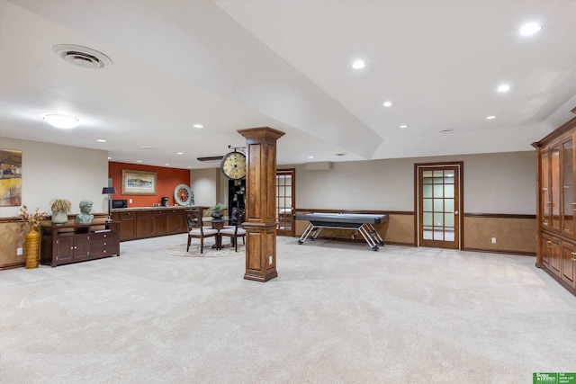 recreation room featuring french doors, light colored carpet, and ornate columns