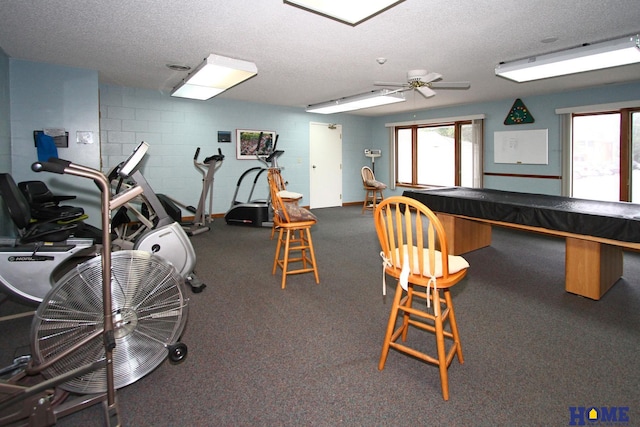 rec room featuring ceiling fan, a textured ceiling, and pool table