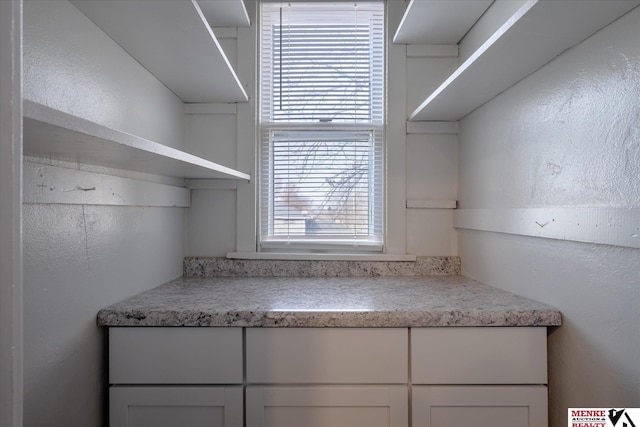 kitchen with white cabinetry