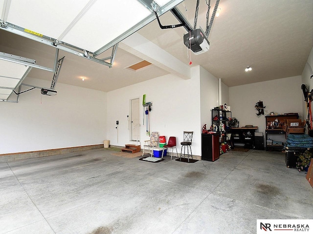 garage featuring a garage door opener