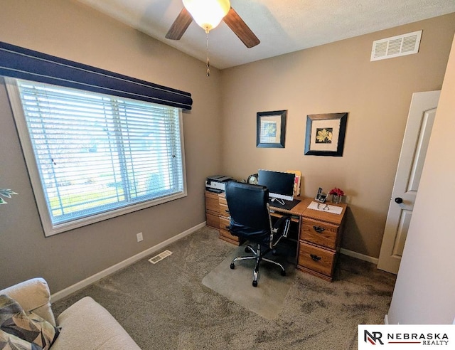 office area with carpet floors and ceiling fan