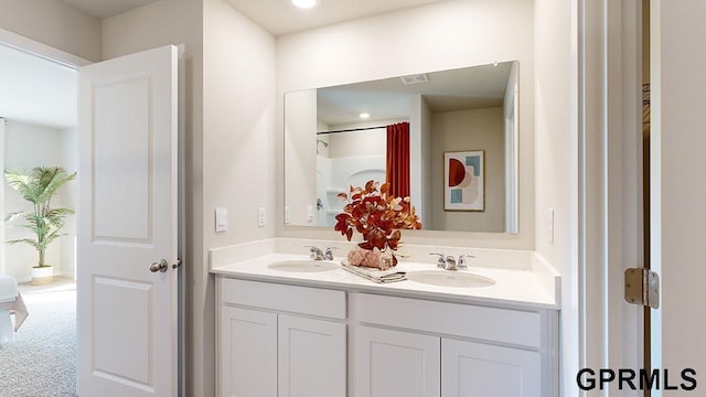 bathroom featuring vanity