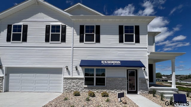 view of front of property featuring a garage