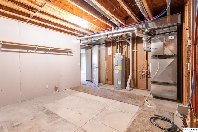 basement with electric water heater and heating unit