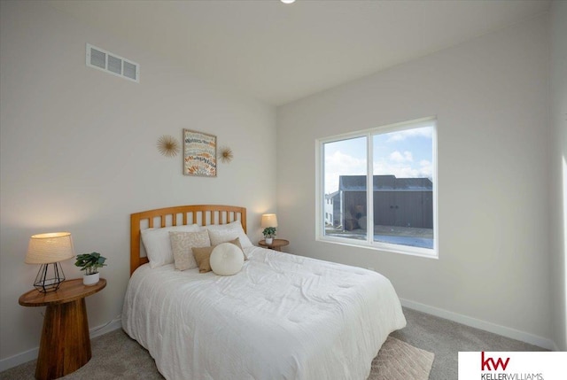 bedroom featuring carpet