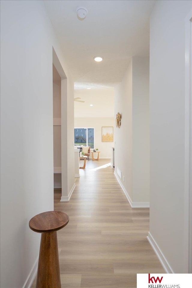 hall featuring light hardwood / wood-style floors