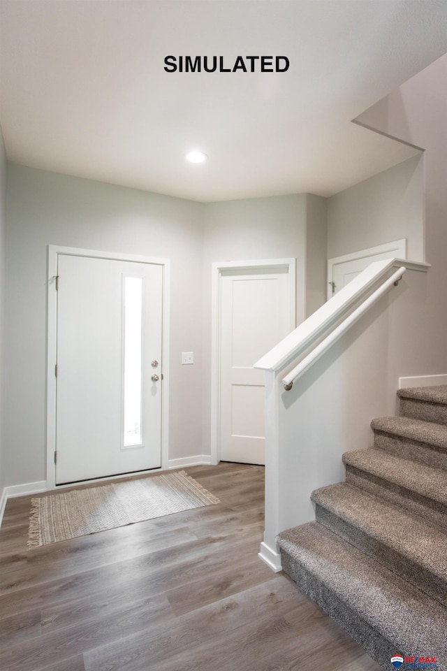 foyer featuring hardwood / wood-style floors