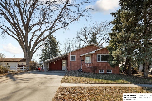 view of front facade with a carport