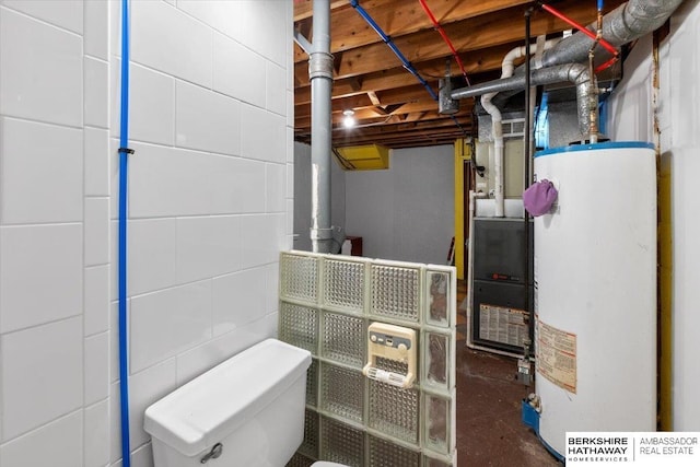 utility room featuring gas water heater