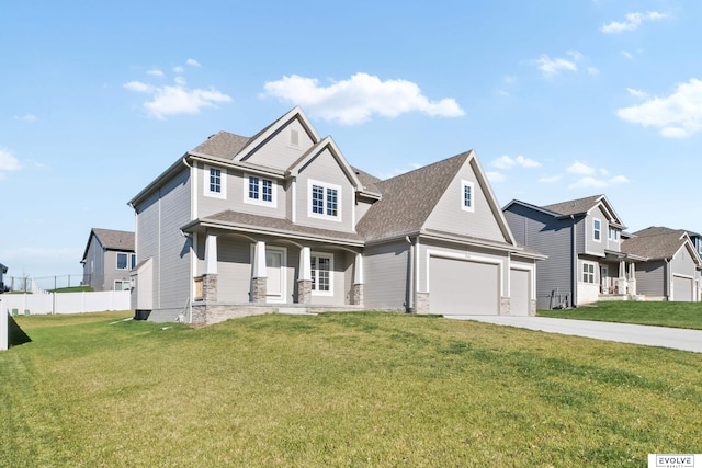 craftsman house featuring a garage, covered porch, and a front lawn