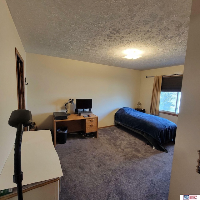 carpeted bedroom with a textured ceiling