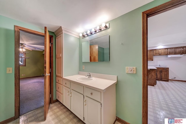 bathroom featuring vanity and ceiling fan