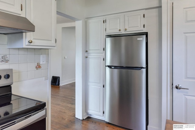 kitchen featuring white cabinets, tasteful backsplash, stainless steel appliances, and dark wood-type flooring