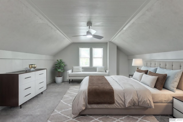 bedroom with light colored carpet, ceiling fan, and lofted ceiling