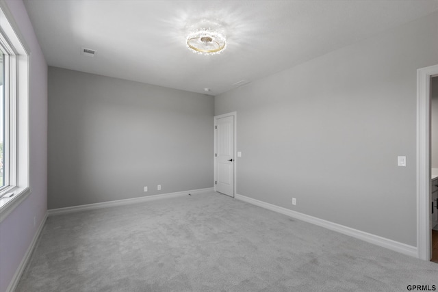 view of carpeted spare room