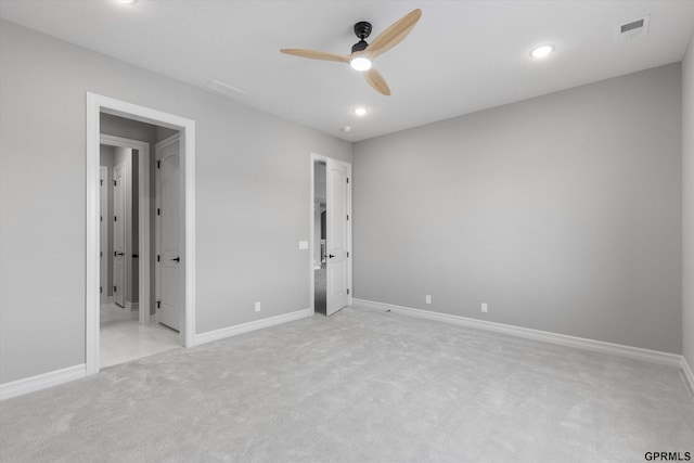 unfurnished bedroom with light carpet and ceiling fan