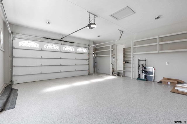 garage featuring a garage door opener