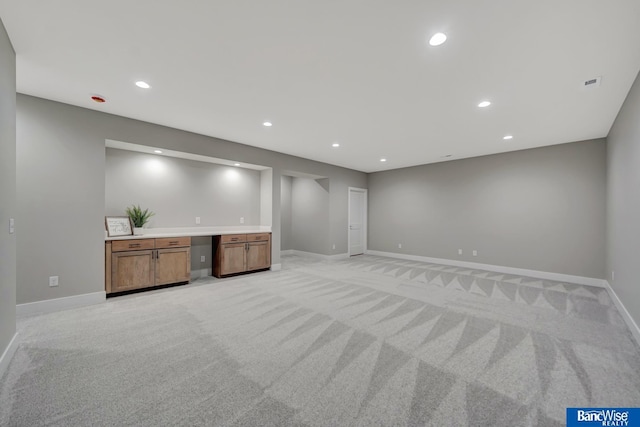 basement with light carpet