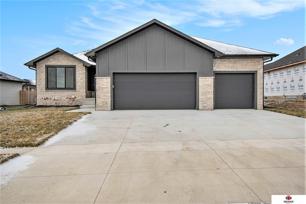 view of front of property with a garage