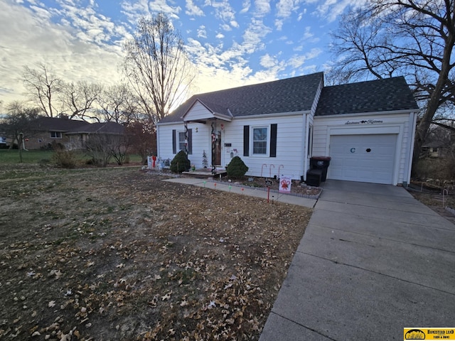 ranch-style house featuring a garage