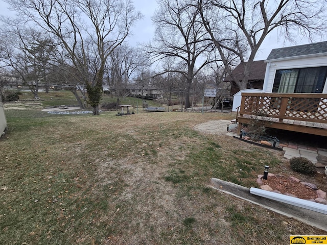 view of yard featuring a deck