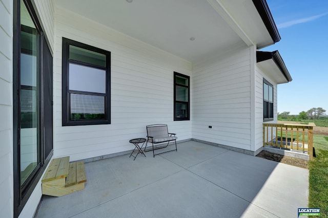 view of patio featuring a porch