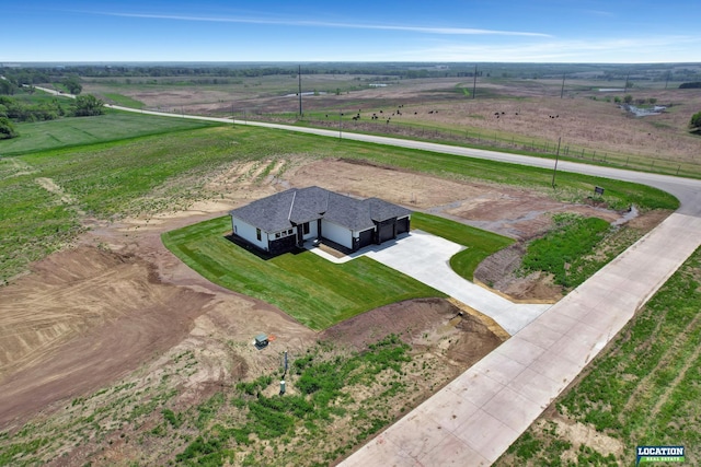 bird's eye view with a rural view