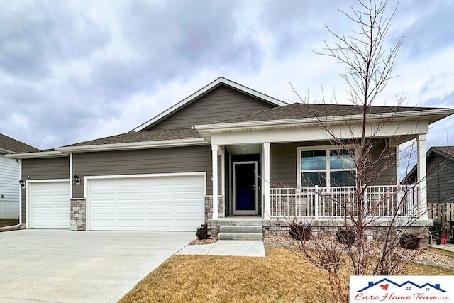 view of front of home featuring a garage and a front lawn