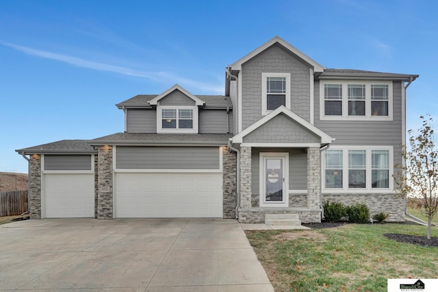 view of front of property with a garage