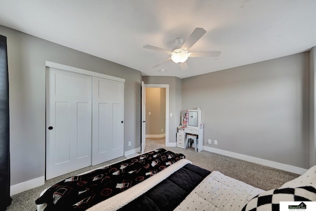 bedroom featuring light carpet, a closet, and ceiling fan