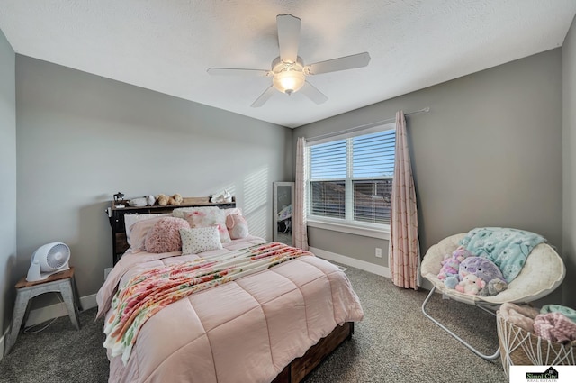 bedroom featuring carpet, a textured ceiling, and ceiling fan