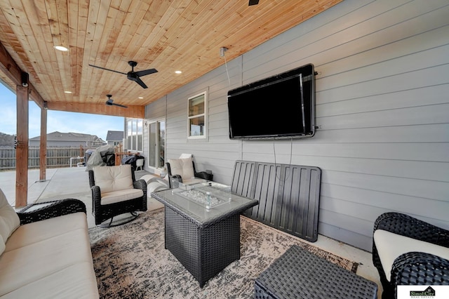 view of patio featuring outdoor lounge area and ceiling fan