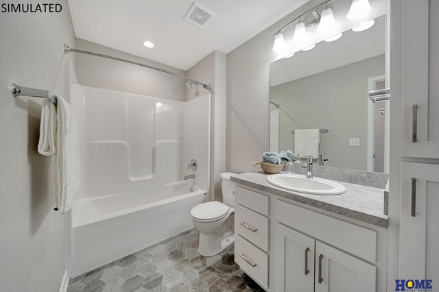 full bathroom with vanity, toilet, and shower / washtub combination