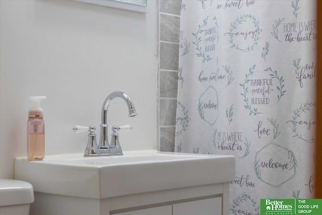 bathroom featuring sink and toilet