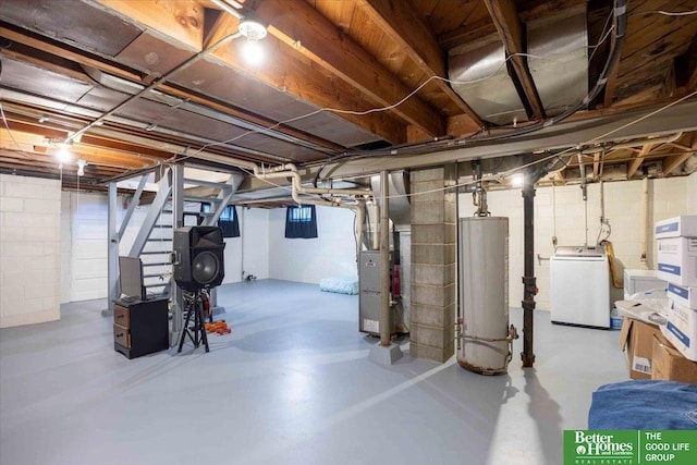 basement with washer / dryer, gas water heater, and heating unit