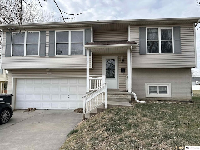 split foyer home featuring a garage