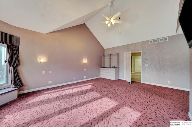 unfurnished living room featuring carpet flooring, high vaulted ceiling, and ceiling fan