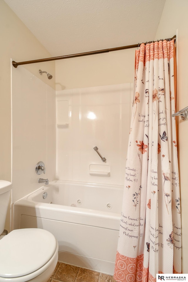 bathroom with tile patterned flooring, toilet, shower / bathtub combination with curtain, and a textured ceiling