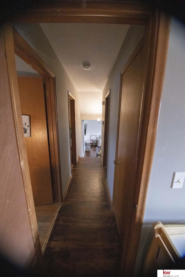 hall featuring dark hardwood / wood-style floors