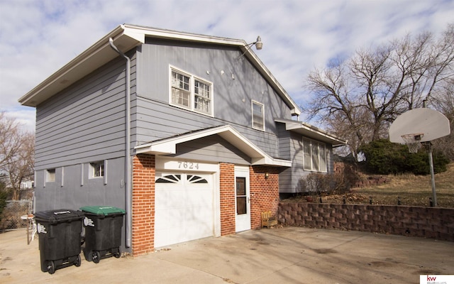 view of home's exterior featuring a garage