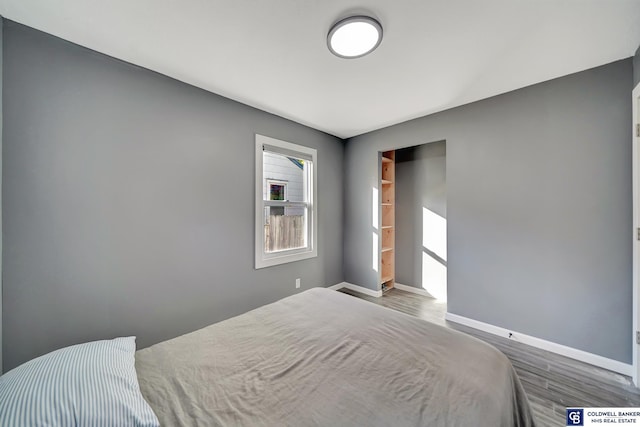 bedroom featuring hardwood / wood-style flooring