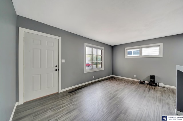 entrance foyer featuring hardwood / wood-style floors