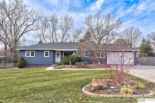 ranch-style home featuring a front yard and a garage