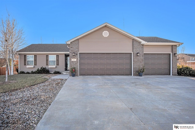 single story home with a garage