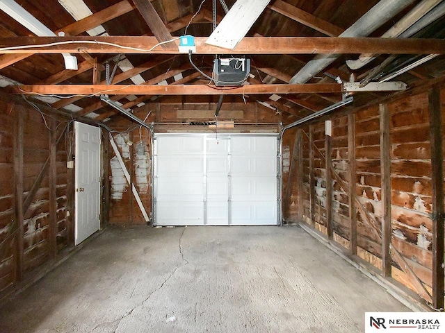 garage featuring a garage door opener